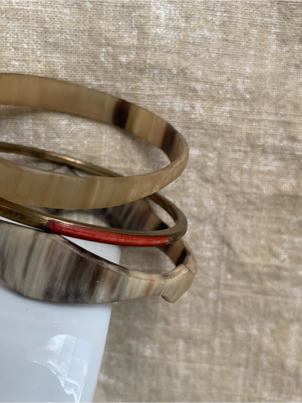 Set of Vintage Horn bracelets w/ a pop of orange enamel brass bracelet